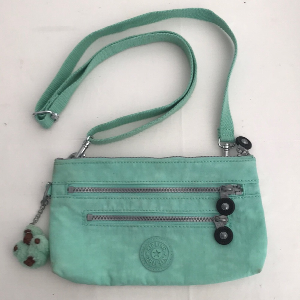 Kipling teal/ turquoise small cross body bag.